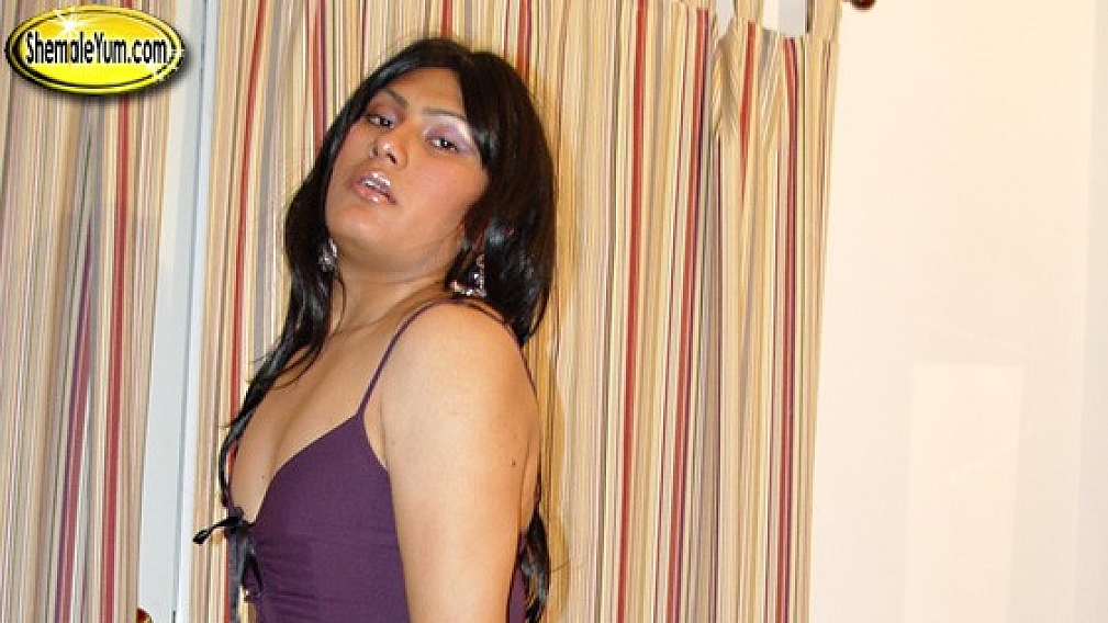 Vanessa Strokes in Purple Thigh Highs